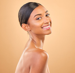 Image showing Face, beauty and smile portrait of woman in studio for skincare, cosmetics, dermatology or makeup. Aesthetic female happy for self care, natural skin or spa facial shine results on a brown background