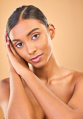 Image showing Face portrait, skincare and beauty of woman in studio isolated on a brown background. Makeup, natural cosmetics and serious Indian female model with spa facial treatment for healthy or flawless skin.