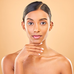 Image showing Skincare, face portrait and beauty of woman in studio isolated on a brown background. Makeup, cosmetics and confident Indian female model with spa facial treatment for healthy, glow or flawless skin.