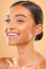 Image showing Skin care, face and smile of woman in studio for glow, cosmetics, dermatology or makeup. Aesthetic female .happy about self love, natural skincare and spa facial shine results on a brown background