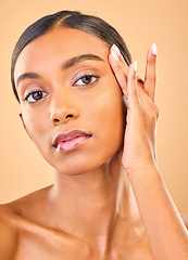 Image showing Skincare, face portrait and beauty of woman in studio isolated on brown background. Natural makeup, cosmetics and confident Indian female model with spa facial treatment for healthy or flawless skin.