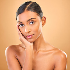 Image showing Skincare, face portrait and beauty of woman in studio isolated on brown background. Makeup, cosmetics and confident Indian female model with spa facial treatment for healthy, glowing or flawless skin