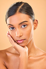 Image showing Skincare, face portrait and beauty of woman in studio isolated on brown background. Makeup, serious cosmetics and confident Indian female model with spa facial treatment for healthy or flawless skin.