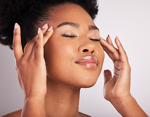 Image showing Skincare, woman and face massage closeup of beauty, dermatology and facial treatment. Spa, wellness and skin glow aesthetic with a studio background with young female, cosmetics and manicure nails