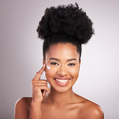 Image showing Black woman, face and moisturizer cream for skincare beauty or cosmetics against a gray studio background. Portrait of happy African female with smile for moisturizing creme, lotion or facial product