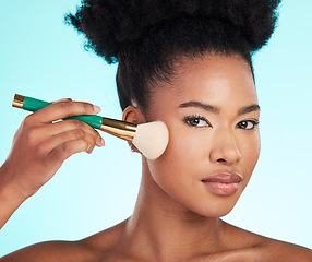 Image showing Makeup, brush and portrait of black woman for beauty, cosmetics and glamour on blue background. Salon, cosmetology and face of girl with brushes for foundation, skincare and application in studio