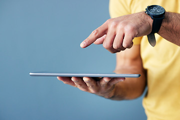 Image showing Man, hands and tablet pointing on mockup for interactive design, touch or networking against a studio background. Hand of male with finger point gesture on mobile responsive touchscreen on copy space