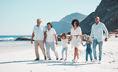 Image showing Beach, grandparents and children walking with parents to relax on summer holiday, vacation and weekend. Happy family, travel and mother, dad and kids holding hands for fun, bonding and quality time