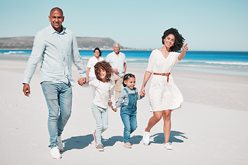 Image showing Happy, beach and family holding hands while on a walk together on summer vacation, adventure or weekend trip. Love, activity and parents with their children by the ocean on tropical holiday in Mexico