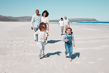 Image showing Mother, father and children play on beach to relax on summer holiday, vacation and weekend. Happy family, grandparents and mom, dad and girls running for freedom, adventure and quality time by ocean