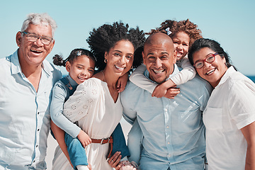 Image showing Portrait, big family and smile at beach on vacation, bonding and care outdoors. Holiday relax, summer trip and happy father, mother and children, girls and grandparents enjoying quality time together