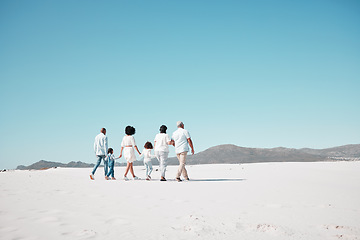 Image showing Mother, dad and children with grandparents on beach to relax on summer holiday, vacation and weekend. Happy family, parents and back of kids, grandpa and grandma for walking, bonding and quality time