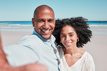 Image showing Couple, smile and selfie portrait at beach on vacation, bonding and care at seashore. Holiday love, summer ocean and man and woman taking pictures for social media, profile picture or happy memory.