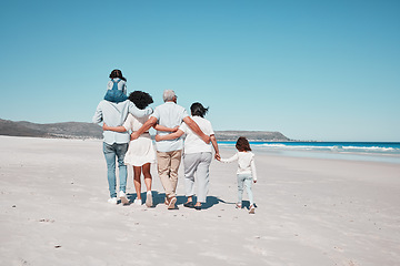 Image showing Back of family on beach walking with children to relax on summer holiday, vacation and weekend together. Travel mockup, ocean and grandparents, parents and kids hug for bonding, quality time and calm