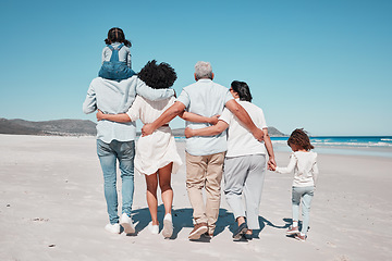Image showing Back of family on beach walking with children to relax on summer holiday, vacation and weekend together. Travel mockup, ocean and grandparents, parents and kids hug for bonding, quality time and calm