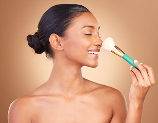 Image showing Makeup brush, smile and happy woman with natural beauty, wellness and shine from cosmetics. Facial skin glow, relax and cosmetic artist tool of a young female model with self care in a studio