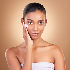 Image showing Skincare, beauty cream and portrait of a healthy woman with cosmetic and spa lotion. Isolated, studio background and young model with sunscreen for face cleaning, cosmetics and dermatology facial