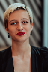 Image showing Pretty businesswoman, successful confidence in a modern coffe shop. Selective focus