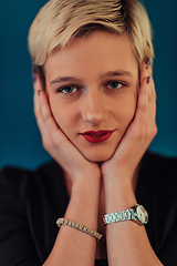 Image showing Photo Beautiful businesswoman, successful confident young woman posing with hands on face. Selective focus