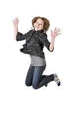 Image showing Teenage girl jumping on white background