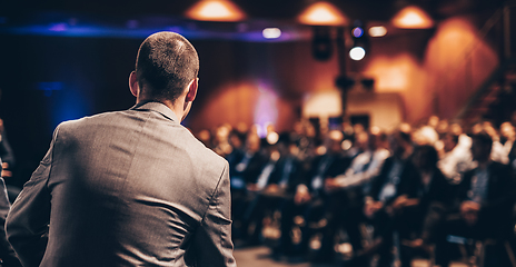 Image showing Public speaker giving talk at Business Event.