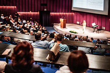 Image showing Woman giving presentation on business conference event.