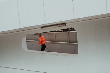 Image showing Women in sports clothes running in a modern urban environment. The concept of a sporty and healthy lifestyle