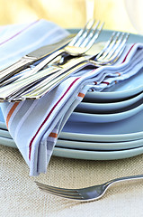 Image showing Plates and cutlery