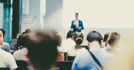 Image showing Male business speaker giving a talk at business conference event.