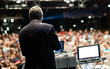 Image showing Public speaker giving talk at Business Event.