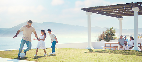 Image showing Family, father and playing football at beach on vacation, having fun and bonding. Soccer, sports and happy dad play with kids or children for exercise, care and enjoying holiday at seashore in summer