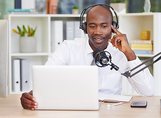 Image showing Laptop, headphones and black man with microphone for podcast, recording or live streaming in office. Business, computer and male entrepreneur or influencer with mic for content creation or radio host