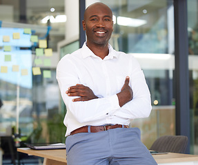 Image showing Portrait, business smile and black man with arms crossed in office with pride for career, job or occupation. Ceo, boss and happy, proud and confident male entrepreneur from Kenya with success mindset