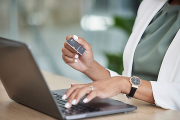 Image showing Woman hands, credit card and laptop for business online shopping, banking or fintech payment at her office. Professional person typing financial code information on computer for loan or transaction