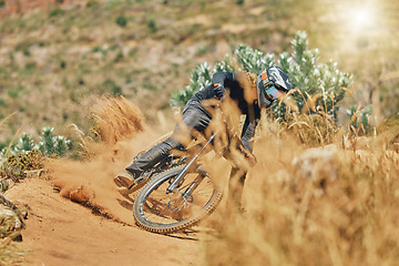 Image showing Extreme sports, man and cycling on bicycle in the countryside for fitness, stunt and freedom. Nature, biking and sporty male cyclist training, practice and speed, action and free on Mexico dirt road