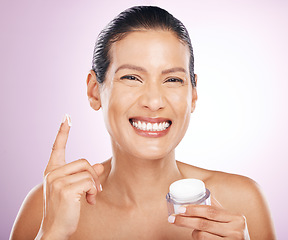 Image showing Face, cream jar and skincare of woman in studio isolated on purple background. Mature portrait, cosmetics and happy female model with dermatology lotion, creme or moisturizer product for healthy skin