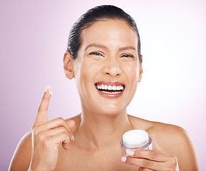 Image showing Face, cream jar and skincare of woman in studio isolated on purple background. Mature portrait, cosmetics and funny female model with dermatology lotion, creme or moisturizer product for healthy skin