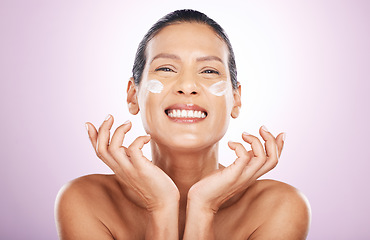 Image showing Face smile, cream and skincare of woman in studio isolated on a purple background. Mature, portrait and happy female model with dermatology lotion, creme and moisturizer cosmetics for healthy skin.