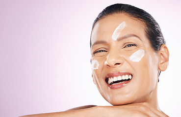 Image showing Face, cream and skincare of woman laughing in studio isolated on purple background mockup. Mature, portrait and happy female with dermatology lotion, creme and moisturizer cosmetics for healthy skin