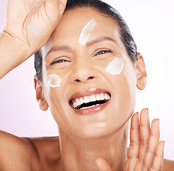 Image showing Face, cream and skincare of woman laughing in studio isolated on a purple background. Mature, portrait and funny female model with dermatology lotion, creme and moisturizer cosmetics for healthy skin