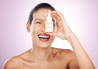 Image showing Laughing, face and woman with serum bottle in studio isolated on purple background. Skincare, cosmetics portrait and happy, funny or mature female model with hyaluronic acid, retinol or essential oil