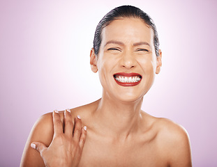 Image showing Smile, face makeup and lipstick of woman in studio isolated on a purple background. Skincare, cosmetics portrait and happy, funny and mature female model with red lip gloss for skin glow or beauty