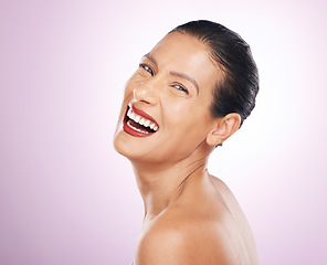 Image showing Laughing, face makeup and lipstick of woman in studio isolated on a purple background. Skincare, cosmetics portrait and happy, funny and mature female model with red lip gloss for skin glow or beauty