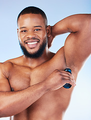 Image showing Deodorant, products and portrait of black man for beauty, grooming and body hygiene on blue background. Skincare, health and male with antiperspirant, fragrance or scent product for underarm wellness