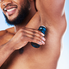 Image showing Deodorant, armpit and black man with products for beauty, grooming and body hygiene on blue background. Skincare, wellness and male with antiperspirant, fragrance and scent product for fresh underarm