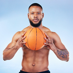 Image showing Basketball, sports and portrait of black man in studio serious face for fitness, exercise and training. Sport mockup, motivation and male athlete focus with ball for playing, workout and practice