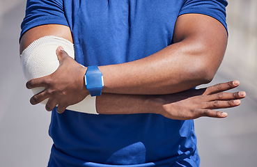 Image showing Black man, arm pain and injury, first aid bandage and health, medical emergency with muscle tension. Wound, inflammation and swollen joint, arthritis or fibromyalgia, painful elbow with injured male