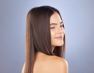 Image showing Woman, beauty and hair care smile in studio for texture, growth and healthy shine on blue background. Aesthetic female model face for haircare, self love and cosmetics for salon or hairdresser mockup