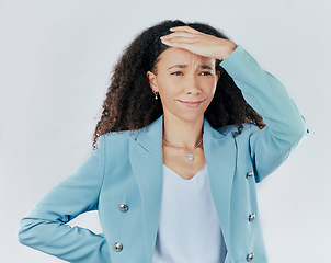 Image showing Confused, headache and a woman looking tired isolated on a white background in a studio. Anxiety, frustrated and a young woman with a painful migraine, stressed and anxious about work on a backdrop