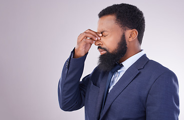 Image showing Business, headache and black man in white background of anxiety, debt and frustrated on studio mockup. Corporate male, face and stress of pain, burnout and bankruptcy in problem of financial failure